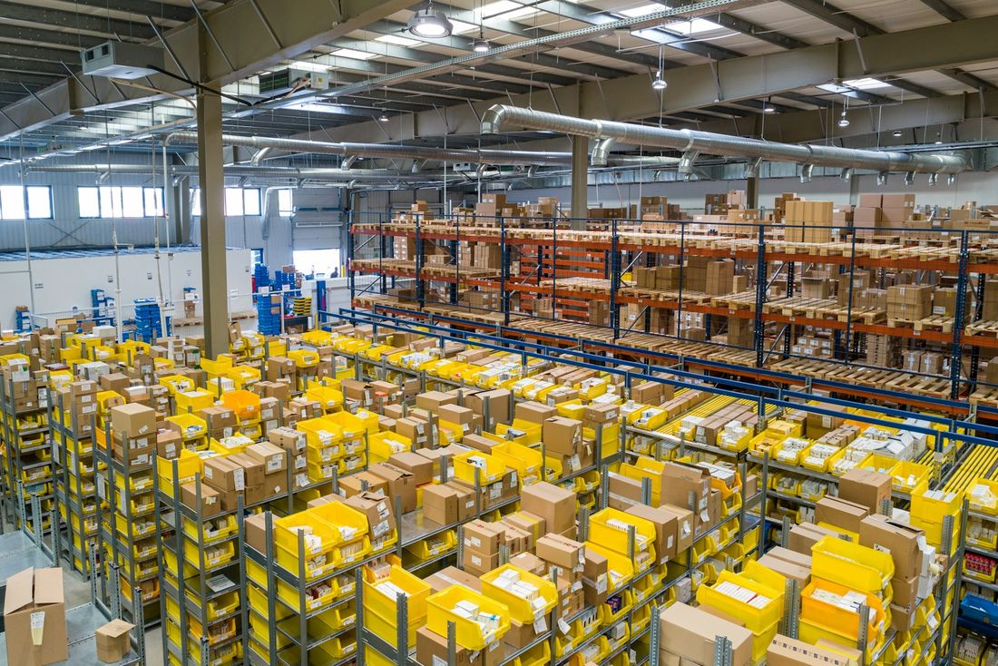 Parts bins and pallet racking in a manufacturing stores area